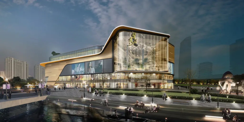 Night render of Zhangjiagang Jinmao Mall from the east street, with a glazed atrium and gold lettering on the facade
